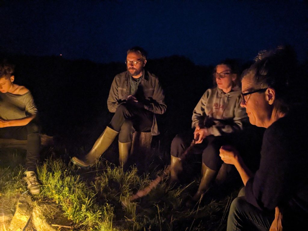 group around a night fire